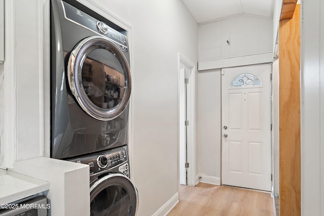 2905 Appleby Dr, Ocean Twp, NJ 07712 - laundry room featuring stacked washer / dryer and light wood finished floors
