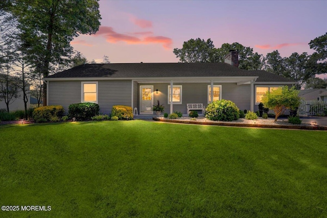 48 Crest Dr, Brick, NJ 08724 - ranch-style home featuring a chimney, a front yard, and a porch