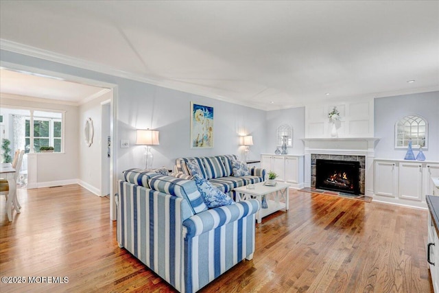 48 Crest Dr, Brick, NJ 08724 - living area with ornamental molding, wood finished floors, a fireplace, and recessed lighting