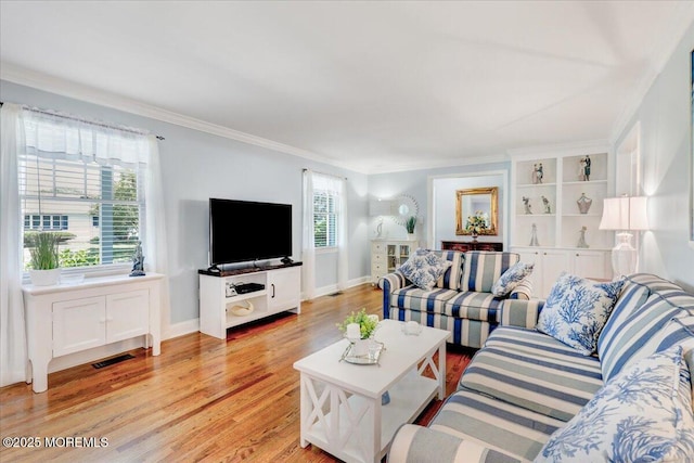 48 Crest Dr, Brick, NJ 08724 - living area with light wood-type flooring and ornamental molding
