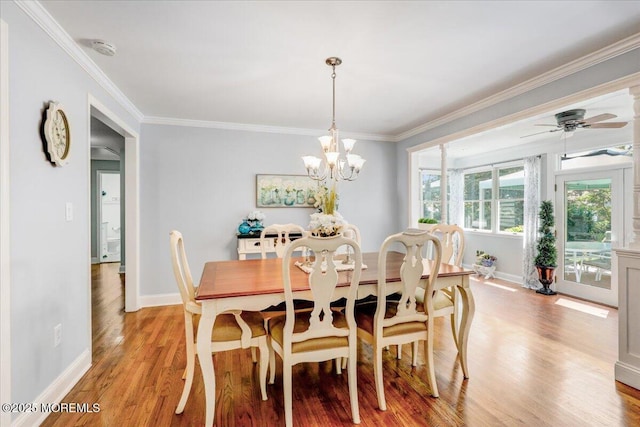 48 Crest Dr, Brick, NJ 08724 - dining space featuring a chandelier, crown molding, light wood-type flooring, and a ceiling fan