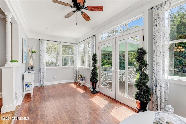 48 Crest Dr, Brick, NJ 08724 - sunroom with french doors, wood finished floors, plenty of natural light, and crown molding