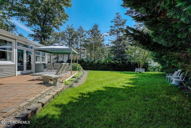 48 Crest Dr, Brick, NJ 08724 - view of green lawn featuring french doors and a patio