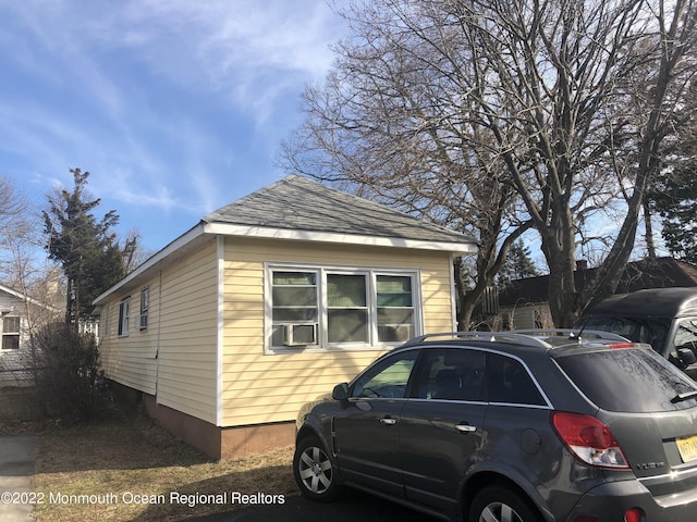 267 Roosevelt Ave, Oakhurst, NJ 07755 - view of side of property with roof with shingles