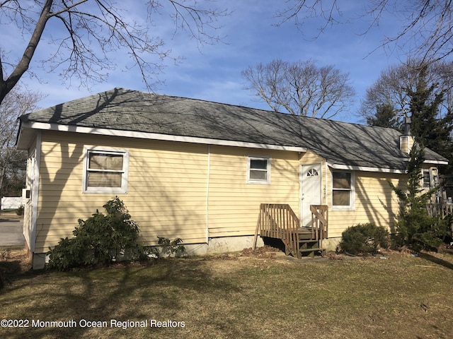 267 Roosevelt Ave, Oakhurst, NJ 07755 - rear view of property with a lawn
