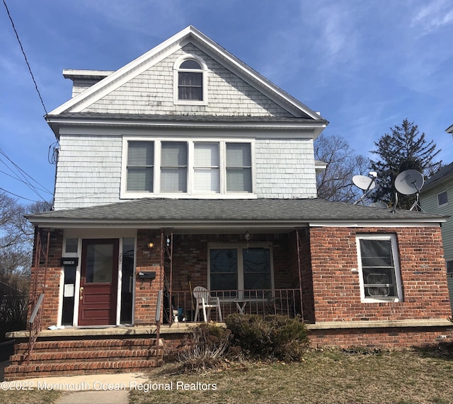 267 Roosevelt Ave, Oakhurst, NJ 07755 - view of front of home with a porch and brick siding