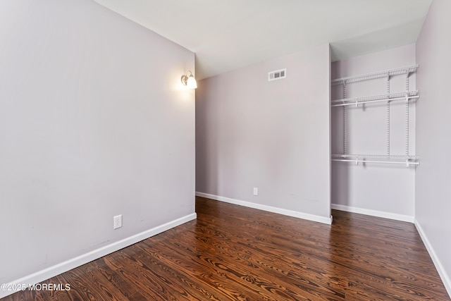 93 Barker Ave, Shrewsbury Twp, NJ 07724 - unfurnished bedroom with wood finished floors and a closet