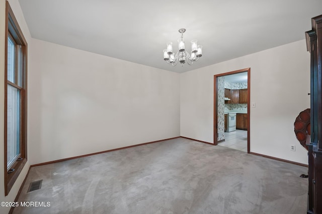 38 Pine St, Lincroft, NJ 07738 - unfurnished room with a chandelier and light carpet