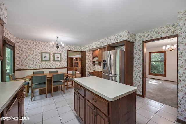 38 Pine St, Lincroft, NJ 07738 - kitchen with appliances with stainless steel finishes, a chandelier, wallpapered walls, light countertops, and a wainscoted wall