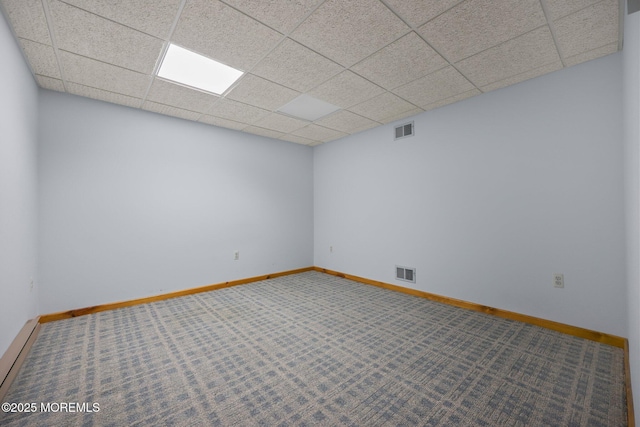 38 Pine St, Lincroft, NJ 07738 - carpeted empty room featuring a paneled ceiling and baseboard heating