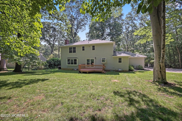 38 Pine St, Lincroft, NJ 07738 - rear view of house featuring a deck, a yard, and a chimney