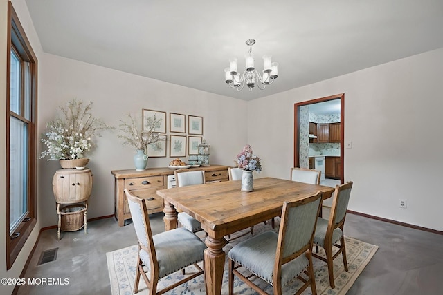 38 Pine St, Lincroft, NJ 07738 - dining space with a chandelier and baseboards