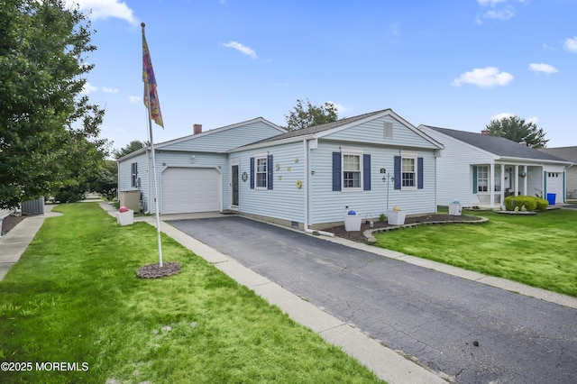 25 Tropicana Ct, Toms River, NJ 08757 - view of front facade featuring a garage, driveway, and a front lawn