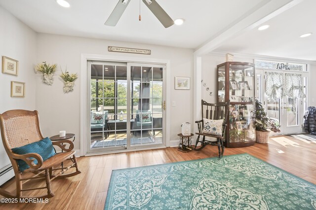 25 Tropicana Ct, Toms River, NJ 08757 - living area with plenty of natural light, wood finished floors, ceiling fan, and recessed lighting