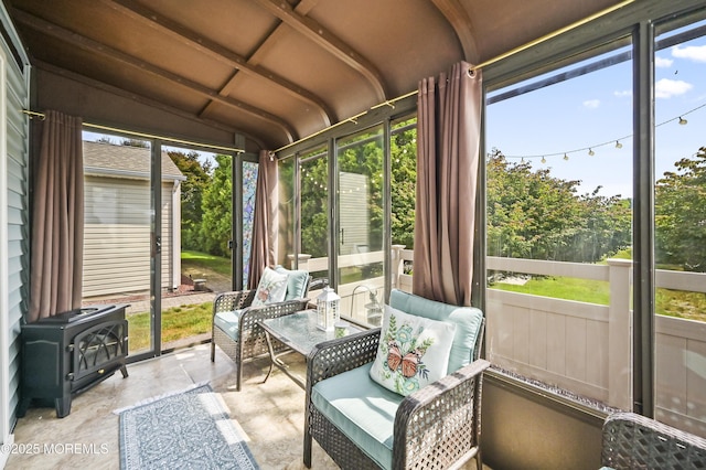 25 Tropicana Ct, Toms River, NJ 08757 - sunroom / solarium featuring a wood stove and lofted ceiling