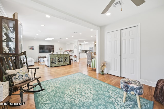25 Tropicana Ct, Toms River, NJ 08757 - living area featuring ceiling fan, wood finished floors, and recessed lighting