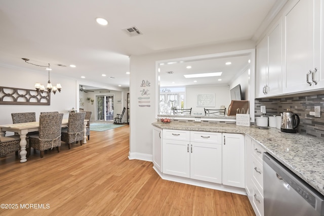 25 Tropicana Ct, Toms River, NJ 08757 - kitchen with stainless steel dishwasher, light wood-style floors, tasteful backsplash, white cabinetry, and recessed lighting