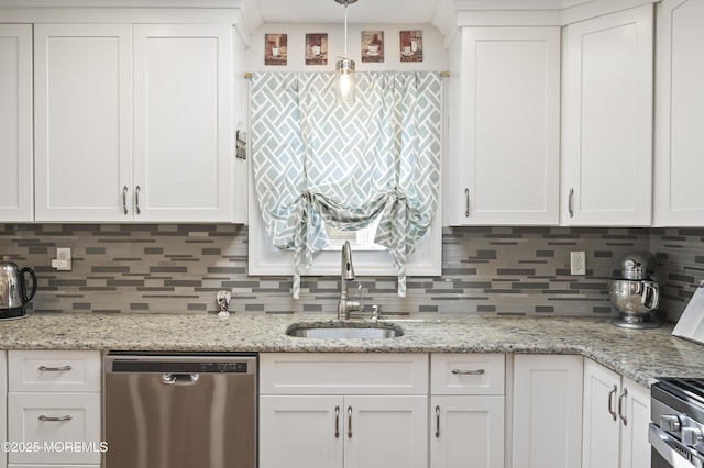 25 Tropicana Ct, Toms River, NJ 08757 - kitchen featuring stainless steel dishwasher, white cabinets, and decorative backsplash