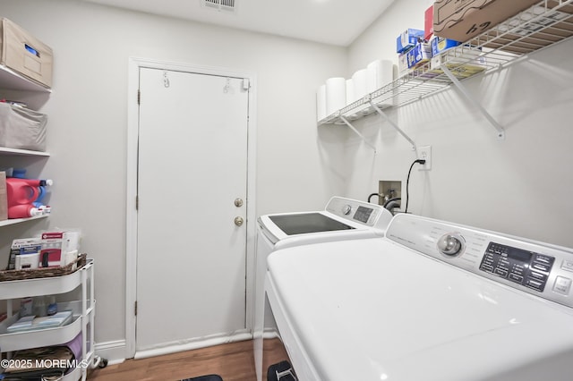 25 Tropicana Ct, Toms River, NJ 08757 - washroom featuring washing machine and clothes dryer and wood finished floors