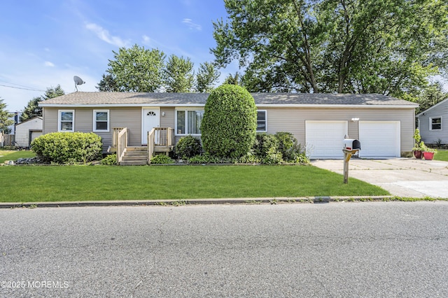 9 Frederick Dr, Bayville, NJ 08721 - ranch-style home with driveway, a front lawn, and a garage