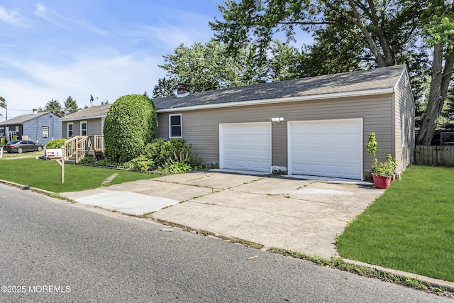 9 Frederick Dr, Bayville, NJ 08721 - view of front facade featuring driveway and a garage