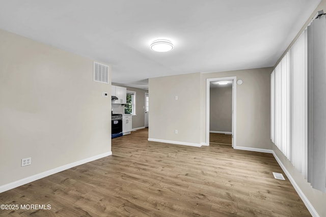 9 Frederick Dr, Bayville, NJ 08721 - unfurnished living room with wood finished floors