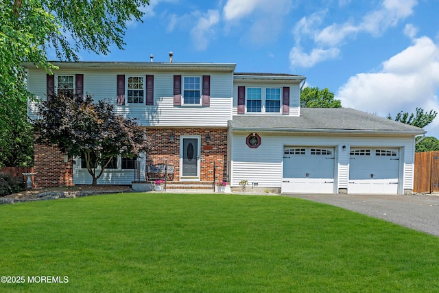 627 Meadow Run, Brick, NJ 08724 - view of front facade featuring asphalt driveway, an attached garage, and brick siding