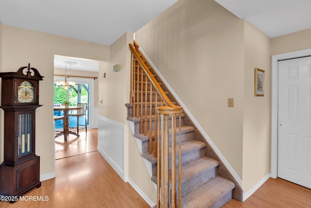 627 Meadow Run, Brick, NJ 08724 - stairway with wood finished floors and a chandelier