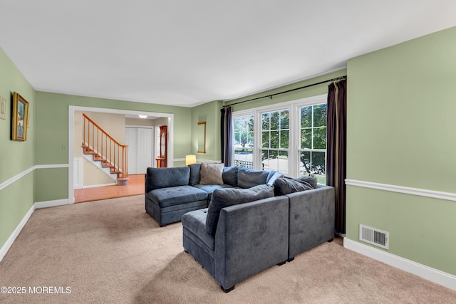 627 Meadow Run, Brick, NJ 08724 - living area with stairway and light carpet