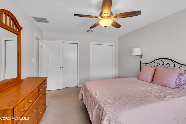627 Meadow Run, Brick, NJ 08724 - bedroom with light carpet, multiple closets, and ceiling fan