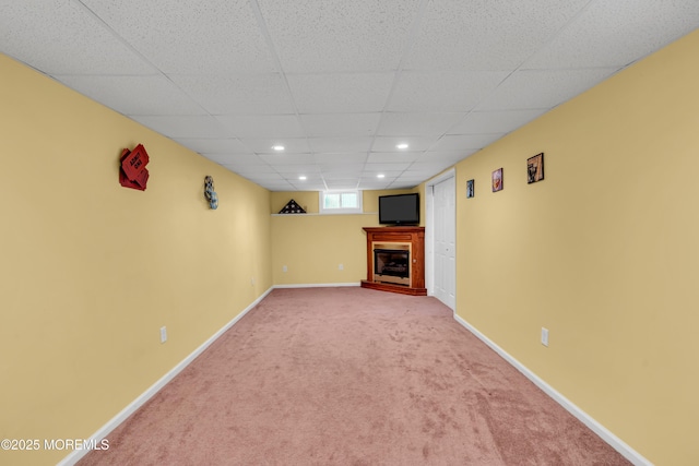 627 Meadow Run, Brick, NJ 08724 - basement with a fireplace with raised hearth, carpet floors, a drop ceiling, and recessed lighting