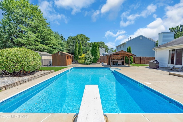627 Meadow Run, Brick, NJ 08724 - view of pool with a gazebo, a fenced backyard, a storage shed, a diving board, and a patio area