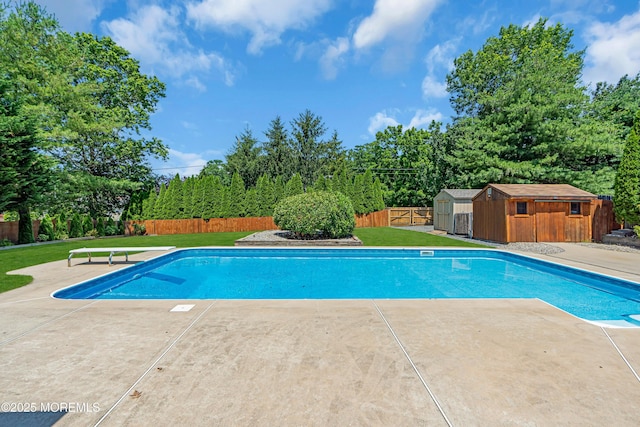 627 Meadow Run, Brick, NJ 08724 - view of pool with a diving board, a storage shed, a patio, and a fenced backyard