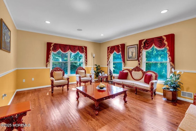 1721 Azure Dr, Wall, NJ 07753 - living area with wood finished floors, crown molding, and recessed lighting