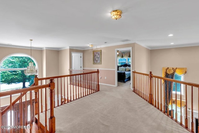 1721 Azure Dr, Wall, NJ 07753 - hall featuring an upstairs landing, light colored carpet, a chandelier, ornamental molding, and recessed lighting