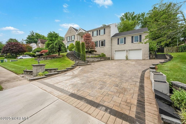 6 Opatut Ct, Morganville, NJ 07751 - view of front of home featuring driveway, a garage, and stairs