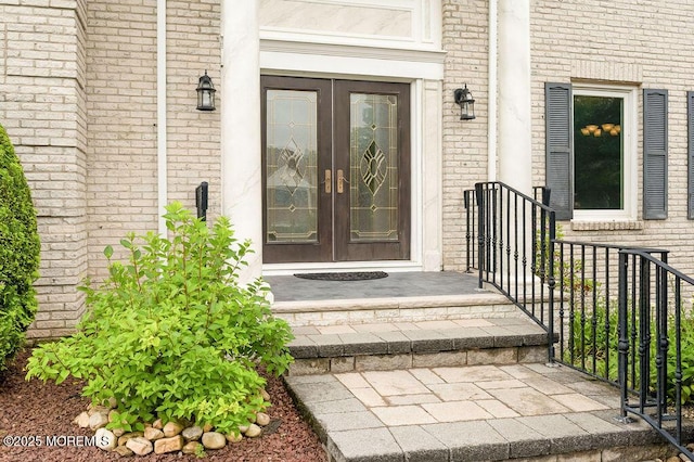 6 Opatut Ct, Morganville, NJ 07751 - property entrance with french doors and brick siding