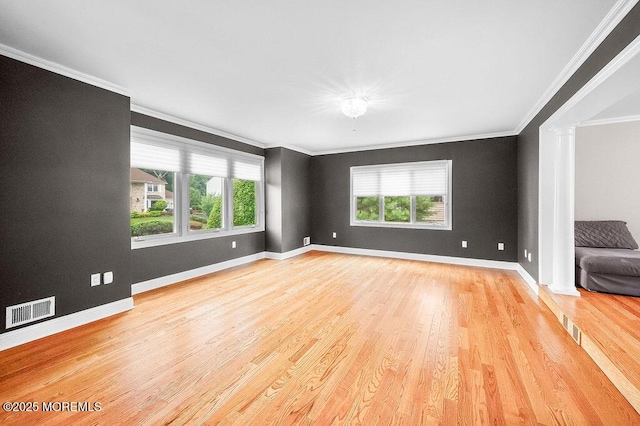 6 Opatut Ct, Morganville, NJ 07751 - empty room with crown molding and light wood-style flooring