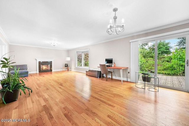 6 Opatut Ct, Morganville, NJ 07751 - living room featuring a chandelier, light wood-style flooring, an office area, crown molding, and a glass covered fireplace