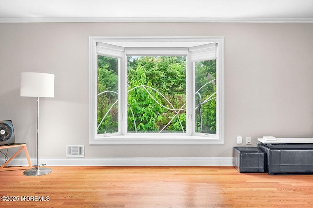 6 Opatut Ct, Morganville, NJ 07751 - unfurnished room with crown molding, healthy amount of natural light, and wood finished floors