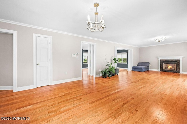 6 Opatut Ct, Morganville, NJ 07751 - living room featuring a chandelier, light wood-style floors, crown molding, and a premium fireplace