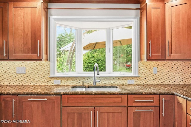 6 Opatut Ct, Morganville, NJ 07751 - kitchen with backsplash, dark stone counters, and brown cabinetry