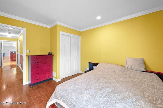 6 Opatut Ct, Morganville, NJ 07751 - bedroom featuring wood finished floors, ornamental molding, a closet, and recessed lighting