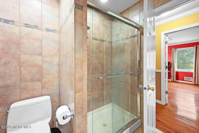 6 Opatut Ct, Morganville, NJ 07751 - bathroom with wood finished floors, ornamental molding, and a shower stall