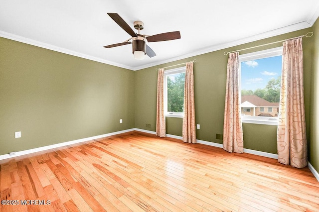6 Opatut Ct, Morganville, NJ 07751 - spare room with crown molding, hardwood / wood-style floors, and a ceiling fan