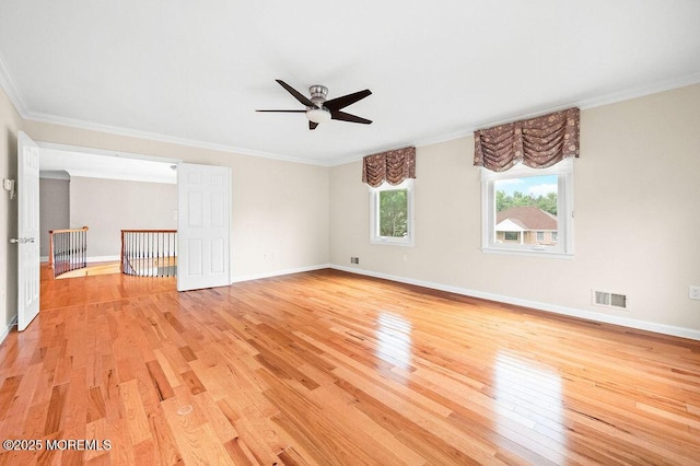 6 Opatut Ct, Morganville, NJ 07751 - spare room featuring light wood-style flooring, ceiling fan, and ornamental molding