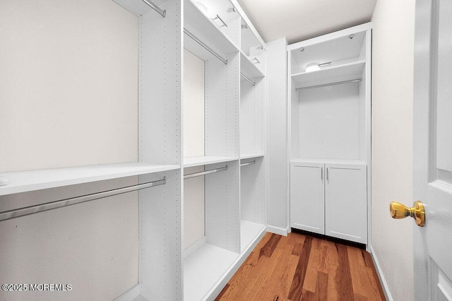 6 Opatut Ct, Morganville, NJ 07751 - spacious closet featuring wood finished floors