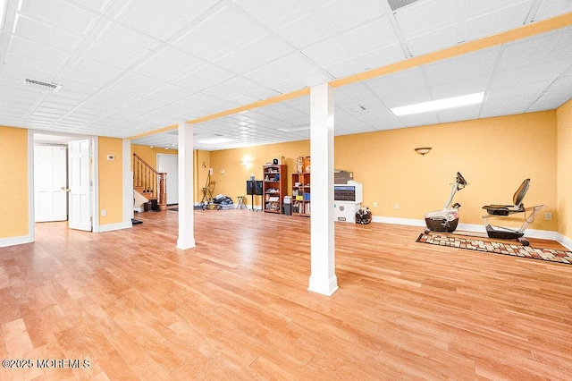 6 Opatut Ct, Morganville, NJ 07751 - workout area with light wood-style floors and a paneled ceiling