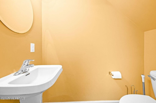 6 Opatut Ct, Morganville, NJ 07751 - half bathroom featuring toilet and lofted ceiling