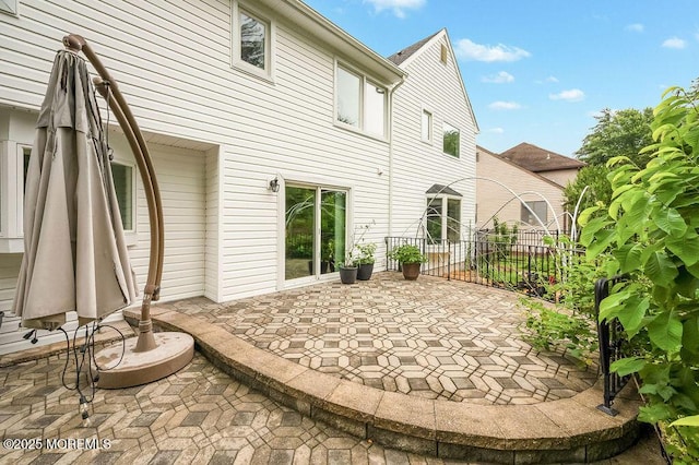 6 Opatut Ct, Morganville, NJ 07751 - rear view of house featuring a patio area